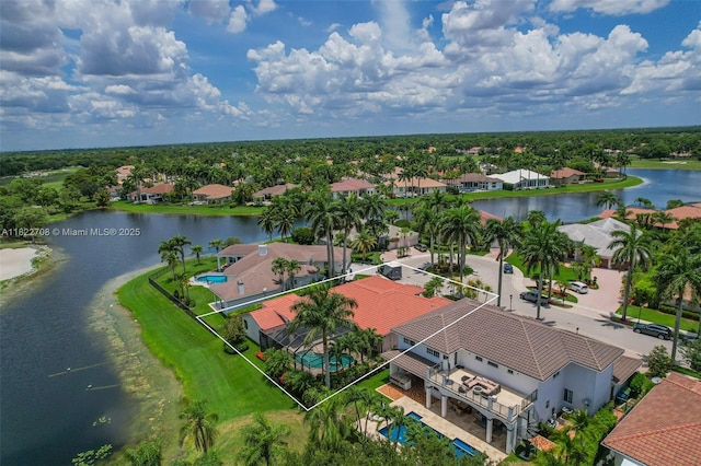 2489 Eagle Watch Ln, Weston, FL 33327 - aerial view of residential area featuring a nearby body of water and property parcel outlined