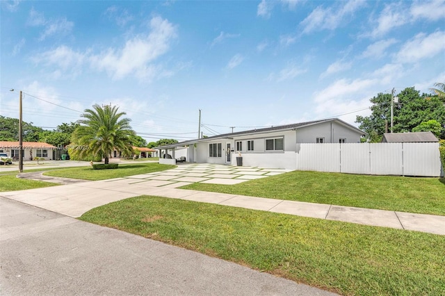 10371 SW 44th St, Miami, FL 33165 - ranch-style home featuring stucco siding, driveway, and a carport
