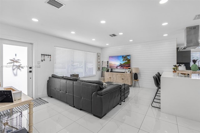 10371 SW 44th St, Miami, FL 33165 - living room featuring recessed lighting and light marble finish flooring