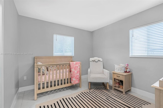 10371 SW 44th St, Miami, FL 33165 - bedroom with a crib and baseboards