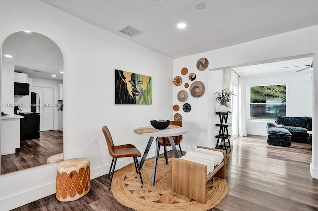 1772 SW 43rd Ave, Fort Lauderdale, FL 33317 - dining area with arched walkways, wood finished floors, a textured ceiling, recessed lighting, and ceiling fan