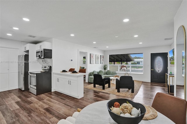 1772 SW 43rd Ave, Fort Lauderdale, FL 33317 - dining space with dark wood-style floors and recessed lighting