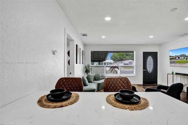 1772 SW 43rd Ave, Fort Lauderdale, FL 33317 - dining area with a textured wall, a textured ceiling, recessed lighting, and wood finished floors