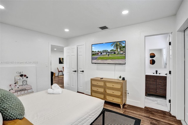 1772 SW 43rd Ave, Fort Lauderdale, FL 33317 - bedroom with recessed lighting, dark wood finished floors, and connected bathroom
