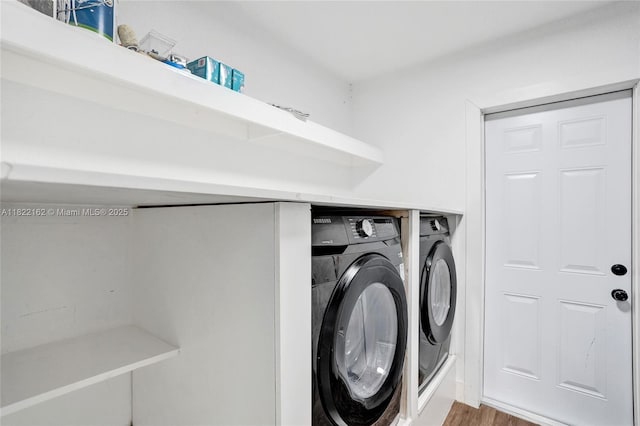 1772 SW 43rd Ave, Fort Lauderdale, FL 33317 - washroom with independent washer and dryer and wood finished floors