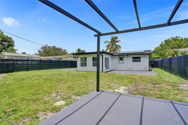 1772 SW 43rd Ave, Fort Lauderdale, FL 33317 - fenced backyard featuring a patio area