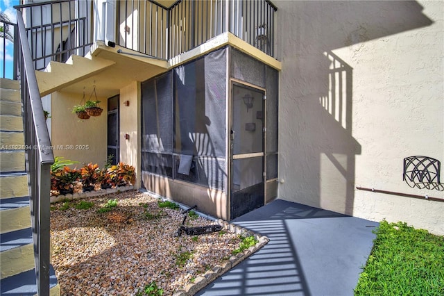 1150 N Liberty Ave Unit 1150G, Homestead, FL 33034 - property entrance with a balcony and stucco siding