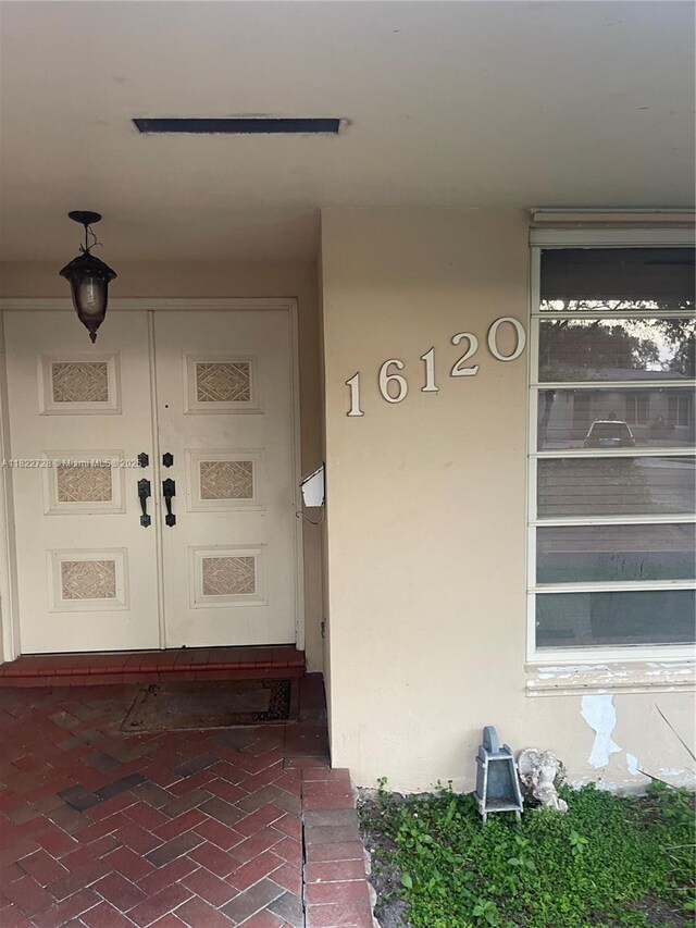 16120 E Troon Cir, Miami Lakes, FL 33014 - property entrance with stucco siding