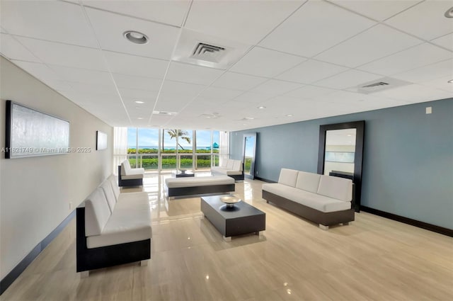 16425 Collins Ave Unit 311, Sunny Isles Beach, FL 33160 - building lobby featuring expansive windows and a paneled ceiling