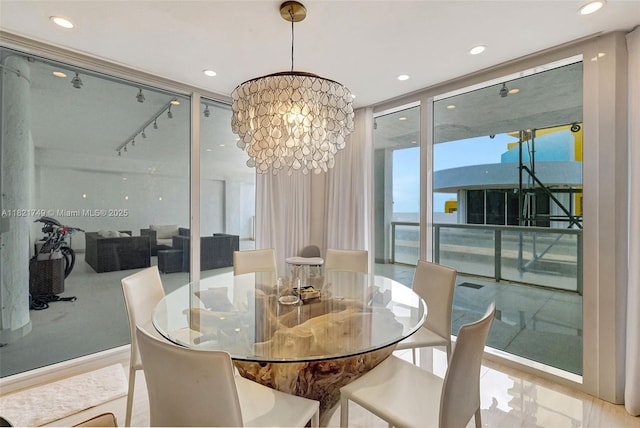 16425 Collins Ave Unit 311, Sunny Isles Beach, FL 33160 - dining area with floor to ceiling windows, a chandelier, and recessed lighting