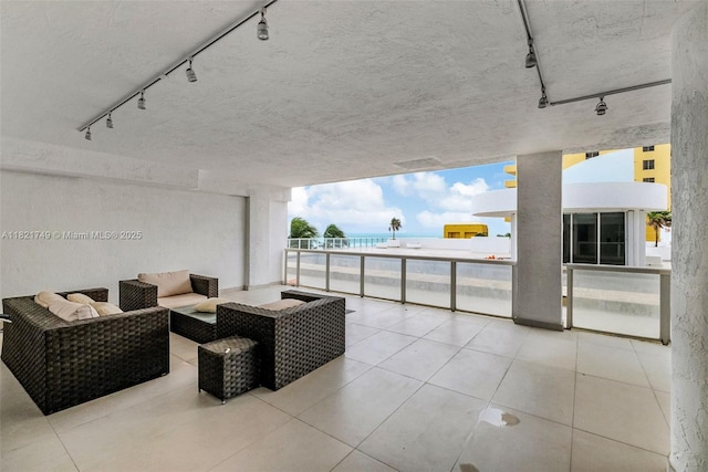 16425 Collins Ave Unit 311, Sunny Isles Beach, FL 33160 - patio / terrace with a water view and outdoor lounge area