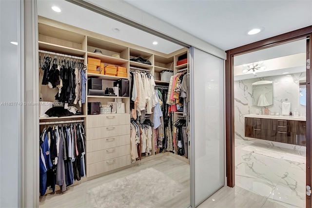 16425 Collins Ave Unit 311, Sunny Isles Beach, FL 33160 - walk in closet with marble finish flooring