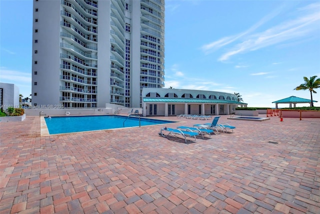 16425 Collins Ave Unit 311, Sunny Isles Beach, FL 33160 - community pool with a hot tub, a gazebo, and a patio