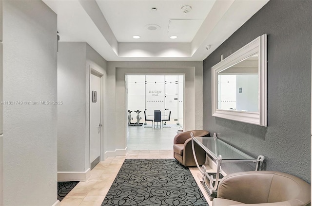16425 Collins Ave Unit 311, Sunny Isles Beach, FL 33160 - hall with a textured wall and a raised ceiling