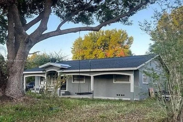 1760 N Clara Ave, Deland, FL 32720 - ranch-style home with stucco siding