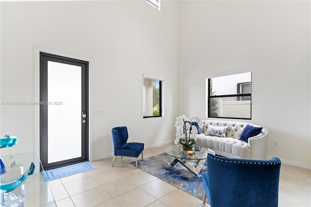 3557 W 94th Ter, Hialeah, FL 33018 - living room featuring a towering ceiling and light tile patterned floors