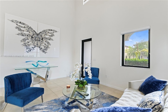 3557 W 94th Ter, Hialeah, FL 33018 - living room featuring tile patterned floors and a towering ceiling