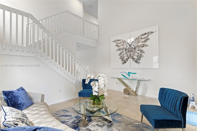3557 W 94th Ter, Hialeah, FL 33018 - tiled living area featuring a high ceiling and stairs