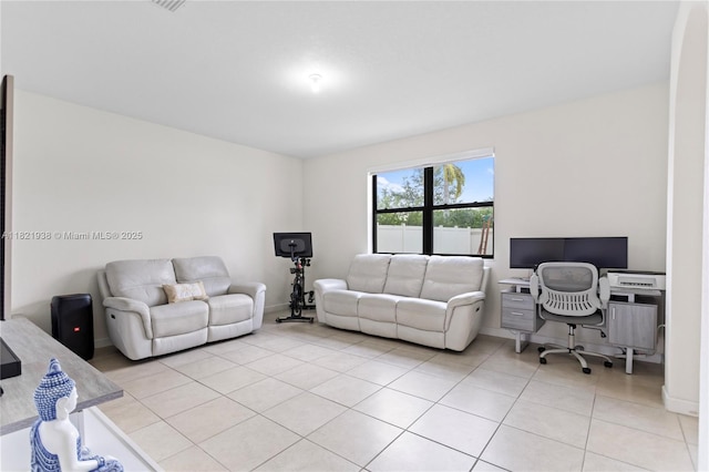 3557 W 94th Ter, Hialeah, FL 33018 - living room with light tile patterned floors and an office area