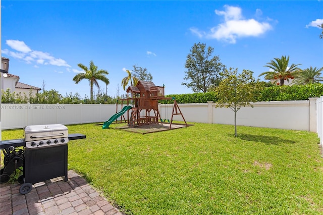 3557 W 94th Ter, Hialeah, FL 33018 - fenced backyard with a playground
