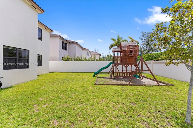 3557 W 94th Ter, Hialeah, FL 33018 - fenced backyard with a playground