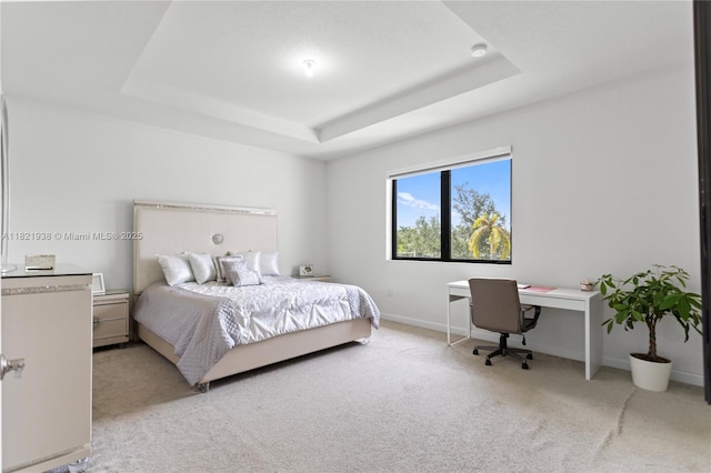 3557 W 94th Ter, Hialeah, FL 33018 - carpeted bedroom with a tray ceiling and a desk