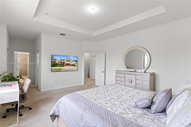 3557 W 94th Ter, Hialeah, FL 33018 - bedroom with a tray ceiling, light carpet, and an office area