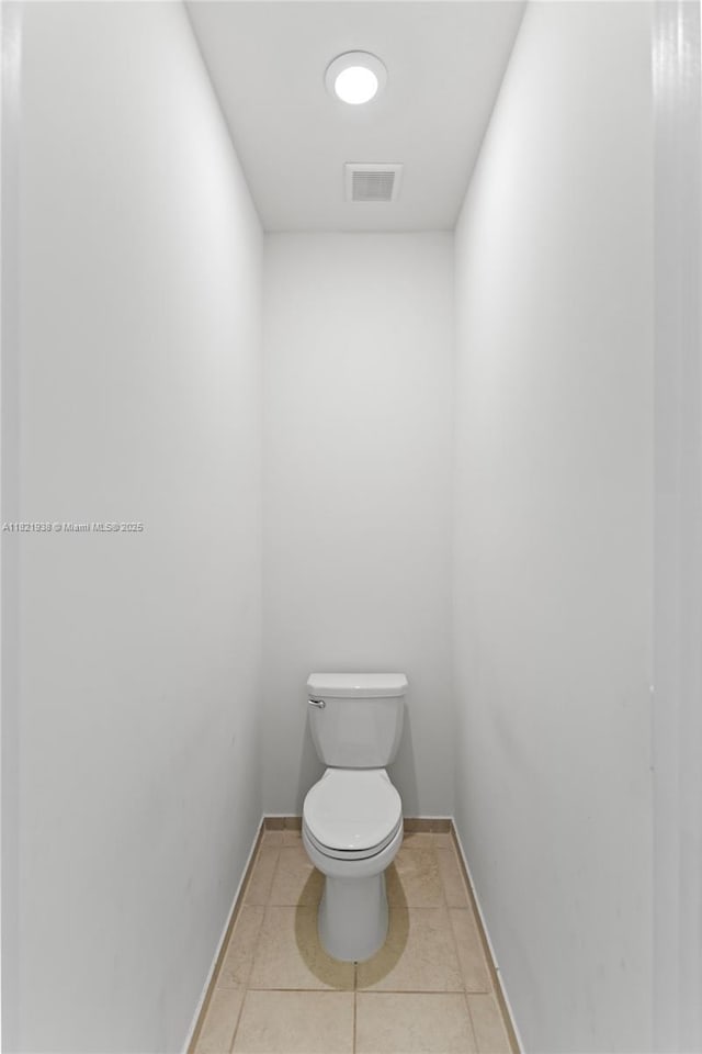 3557 W 94th Ter, Hialeah, FL 33018 - bathroom featuring toilet and tile patterned flooring