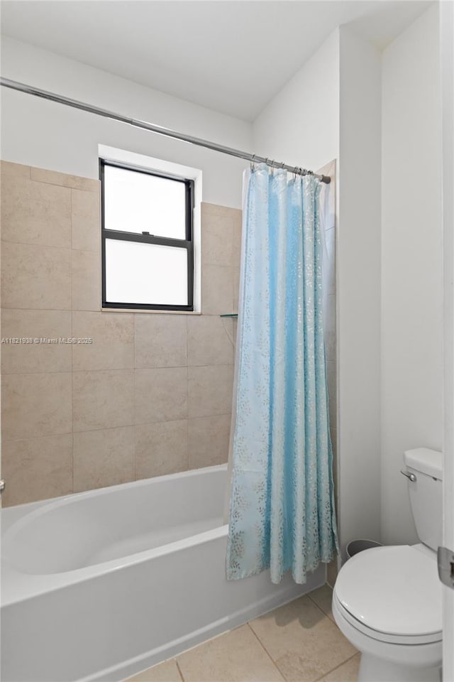 3557 W 94th Ter, Hialeah, FL 33018 - bathroom featuring tile patterned flooring and shower / tub combo