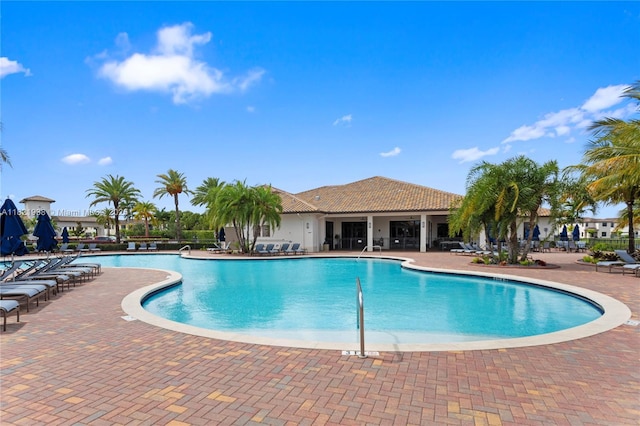 3557 W 94th Ter, Hialeah, FL 33018 - community pool featuring a patio