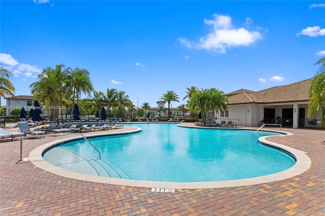 3557 W 94th Ter, Hialeah, FL 33018 - community pool featuring a patio