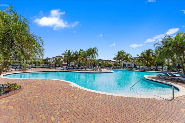 3557 W 94th Ter, Hialeah, FL 33018 - community pool featuring a patio area