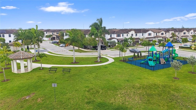 3557 W 94th Ter, Hialeah, FL 33018 - surrounding community featuring a residential view and a lawn