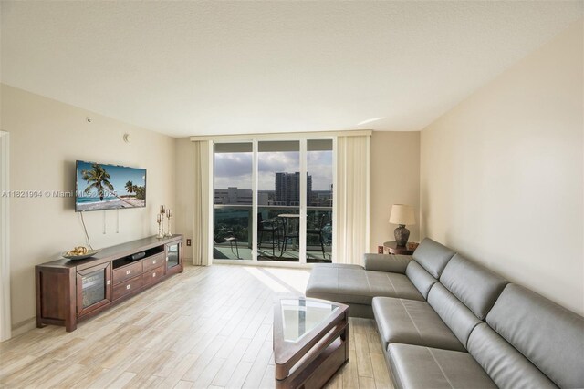 347 N New River Dr E Unit 1505, Fort Lauderdale, FL 33301 - living area featuring a wall of windows and light wood-type flooring
