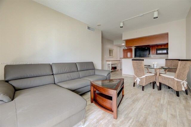 347 N New River Dr E Unit 1505, Fort Lauderdale, FL 33301 - living room featuring light wood-type flooring