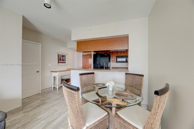 347 N New River Dr E Unit 1505, Fort Lauderdale, FL 33301 - dining room featuring light wood-style floors