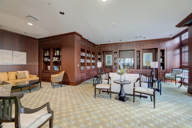 347 N New River Dr E Unit 1505, Fort Lauderdale, FL 33301 - lobby featuring wooden walls, crown molding, and recessed lighting