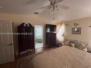 126 Chestnut Cir, Royal Palm Beach, FL 33411 - bedroom featuring lofted ceiling and ceiling fan