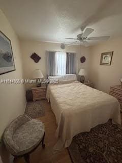 126 Chestnut Cir, Royal Palm Beach, FL 33411 - bedroom featuring a ceiling fan