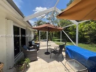 126 Chestnut Cir, Royal Palm Beach, FL 33411 - view of patio / terrace featuring an outdoor living space