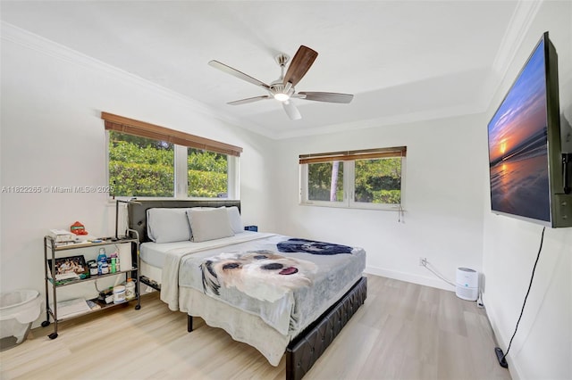 11230 SW 69th Ct, Pinecrest, FL 33156 - bedroom featuring ornamental molding, wood finished floors, and ceiling fan