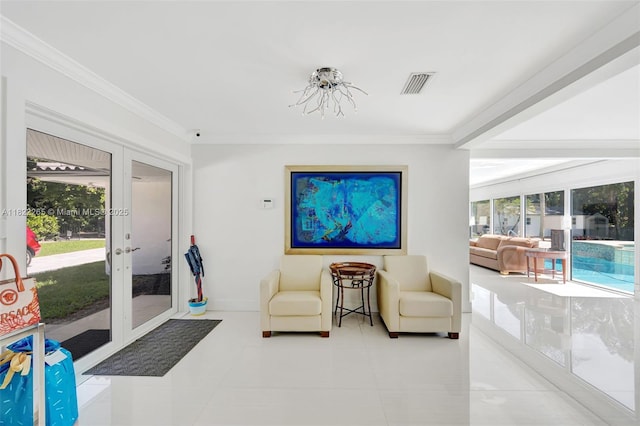 11230 SW 69th Ct, Pinecrest, FL 33156 - sitting room with french doors, plenty of natural light, ornamental molding, and tile patterned flooring