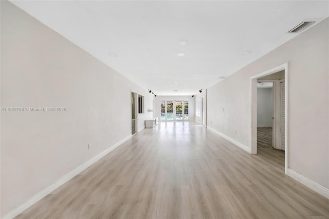 5781 SW 25th St, Miami, FL 33155 - empty room featuring light wood-style flooring and baseboards