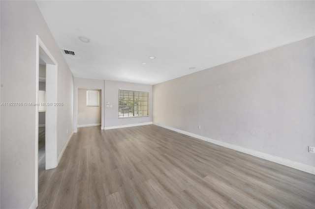 5781 SW 25th St, Miami, FL 33155 - spare room featuring light wood-style floors and baseboards