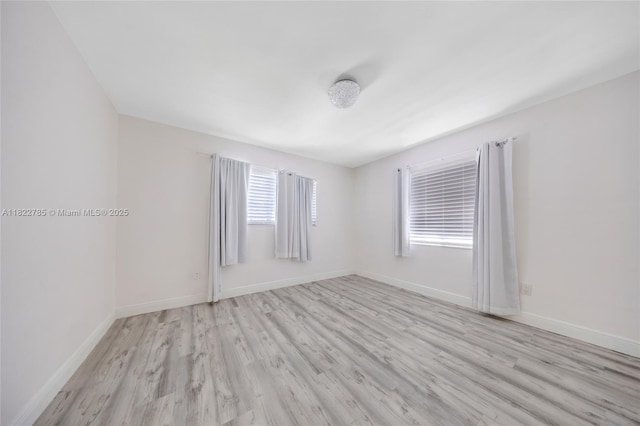 5781 SW 25th St, Miami, FL 33155 - unfurnished room with wood finished floors and baseboards