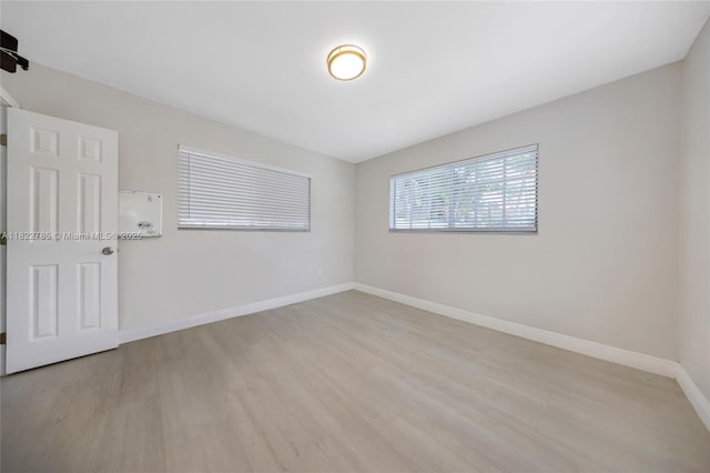 5781 SW 25th St, Miami, FL 33155 - unfurnished room featuring light wood-style flooring and baseboards
