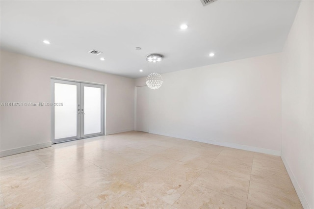 1601 Bay Rd Unit 4, Miami Beach, FL 33139 - spare room featuring recessed lighting and french doors