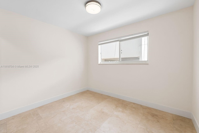 1601 Bay Rd Unit 4, Miami Beach, FL 33139 - unfurnished room with baseboards
