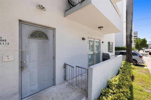 1601 Bay Rd Unit 4, Miami Beach, FL 33139 - property entrance with stucco siding