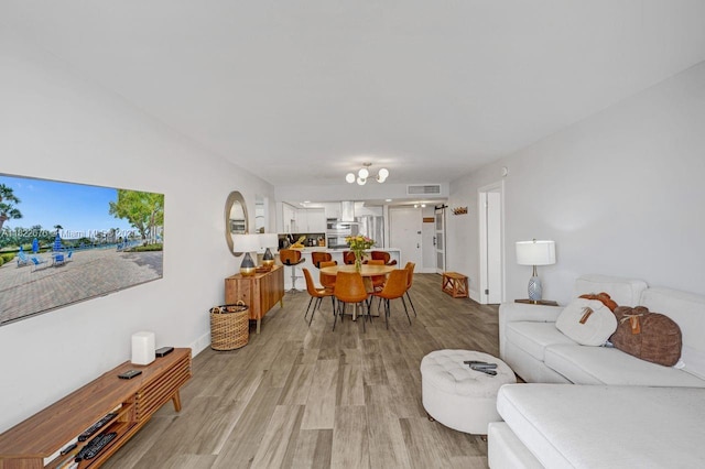 600 Three Islands Blvd Unit 615, Hallandale Beach, FL 33009 - living room with light wood-type flooring